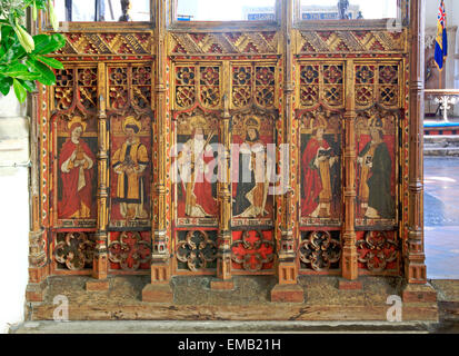 A view of the rood screen on the left side of the chancel arch at the parish church at Ludham, Norfolk, England, United Kingdom. Stock Photo