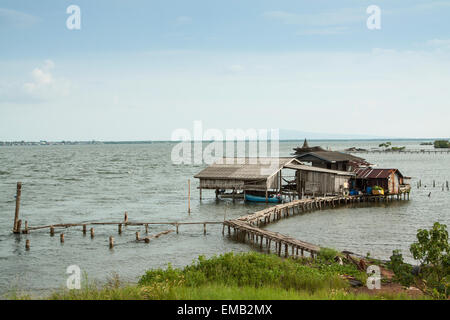 Floating house on the Koh Kong river side in Cambodia, Asia. Stock Photo