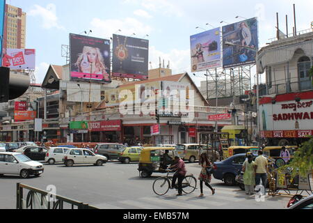 The city of Bengaluru, formerly known as Bangalore, in central southern India. A busy junction on MG Road Stock Photo