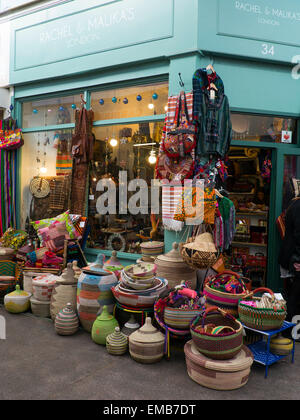 Small independent shop in the covered area of Brixton Market, London, SW9, UK Stock Photo