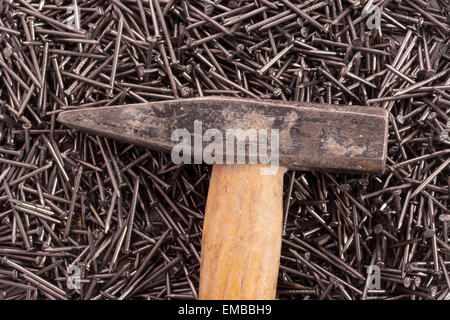 many nails with hand tool close up Stock Photo