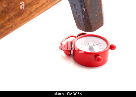 Hammer knocks the alarm isolated on a white background Stock Photo