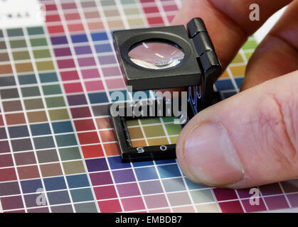 Close-up of a a blurry inkjet cmyk test print with many color squares ...