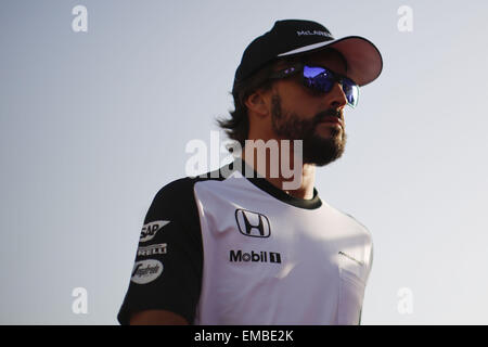 Sakhir, Kingdom of Bahrain. 19th Apr, 2015. FERNANDO ALONSO of Spain and McLaren Honda is seen during the drivers parade prior to the 2015 Formula 1 Bahrain Grand Prix at Bahrain International Circuit in Sakhir, Kingdom of Bahrain. Credit:  James Gasperotti/ZUMA Wire/Alamy Live News Stock Photo