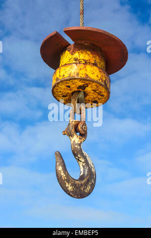 A large industrial crane lifting hook in Whitby harbour Stock Photo