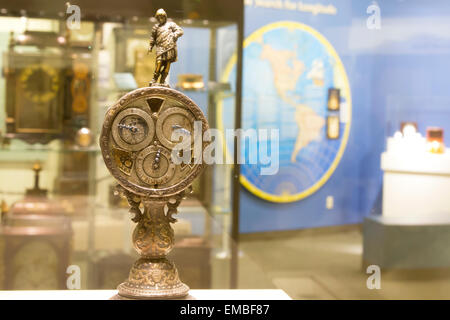 Columbia, PA, USA - April 18, 2015 : Intricate timepiece with Ferdinand Magellan on top and globe in the background. Stock Photo