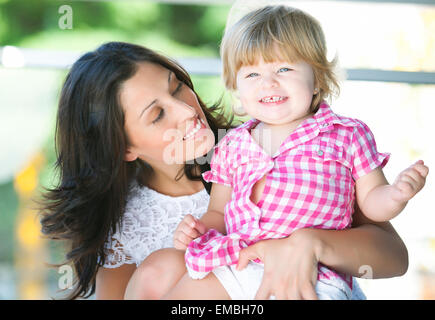 Mother with her beautiful daughter Stock Photo