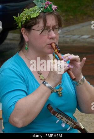 young woman playing the flute Stock Photo