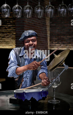 Drummer playing. Statue of an African-American man playing the drums Stock Photo