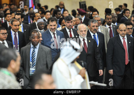 Jakarta, Indonesia. 20th Apr, 2015. The ministers of Asian-African countries walk to the podium for a group photo before the Asian-African Ministerial Meeting during the Asian-African Conference Commemoration 2015 in the Jakarta Convention Centre in Indonesia, April 20, 2015. Ministers of Asia and Africa held a meeting here on Monday in preparation for the Asian-African Summit 2015, which runs from April 22 to April 23. Credit:  Veri Sanovri/Xinhua/Alamy Live News Stock Photo