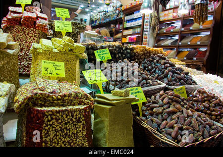 Showing of Turkish sweets, dried fruits and nuts in a stall in the Istanbul spice market Stock Photo