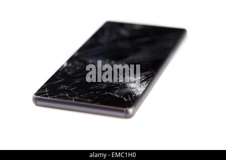 Cellphone with broken screen isolated on white background Stock Photo