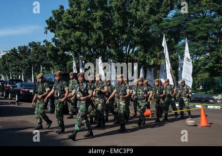 Jakarta, Indonesia. 20th Apr, 2015. Soldiers march outside the Jakarta Convention Center in Jakarta, Indonesia, April 20, 2015. Thousands of soldiers and security force members work for the safety of the Asian-African Conference Commemoration 2015. Credit:  Lui Siu Wai/Xinhua/Alamy Live News Stock Photo