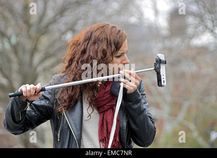 Portrait of young lady taking a selfie in Washington Square Park, Greenwich Village, New York City. Stock Photo