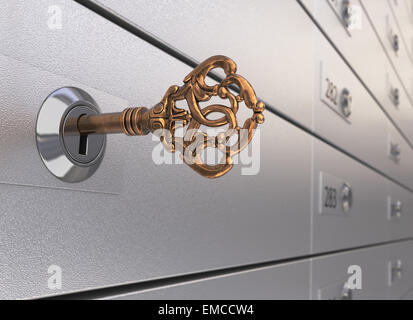 Key in the safe deposit box Stock Photo