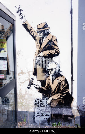 Detail of Banksy's 'spy booth' artwork appeared in Cheltenham, Gloucestershire in April 2014. Stock Photo