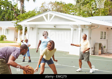 Multi Generation Family Playing Basketball Together Stock Photo - Alamy