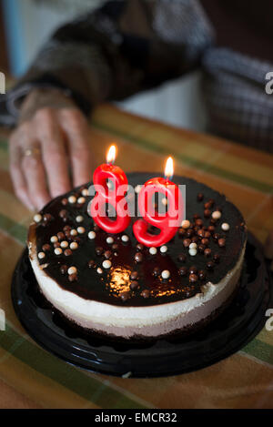 Birthday cake for a 89 year old woman Stock Photo