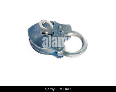 locked vintage padlock with key in keyhole isolated on white background Stock Photo