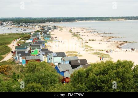 Mudeford Spit beach huts and sandy beach, Hengistbury Head, Christchurch, Dorset, England, UK Stock Photo