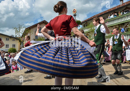 The Schuhplattler is a traditional folk dance popular in the Alpine regions of Bavaria, here on the Market square of Miesbach. Stock Photo