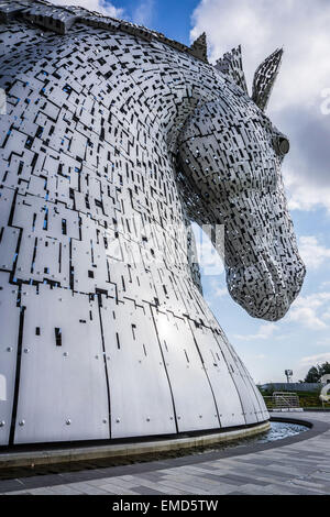 Dramatic daytime shot of the Kelpies statues in Falkirk, Scotland, UK on a sunny day against a blue sky Stock Photo