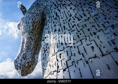 Dramatic daytime shot of the Kelpies statues in Falkirk, Scotland, UK on a sunny day against a blue sky Stock Photo