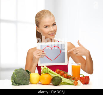 woman with fruits, vegetables and tablet pc Stock Photo