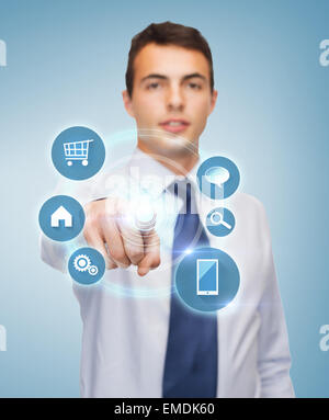 buisnessman pointing finger to virtual screen Stock Photo