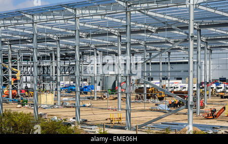 Construction site on Sports Direct property. Metal girder framework being constructed. In Shirebrook, Nottinghamshire, England. Stock Photo