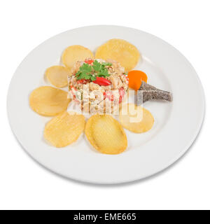 Dish of cod, potato, egg and red pepper... Stock Photo