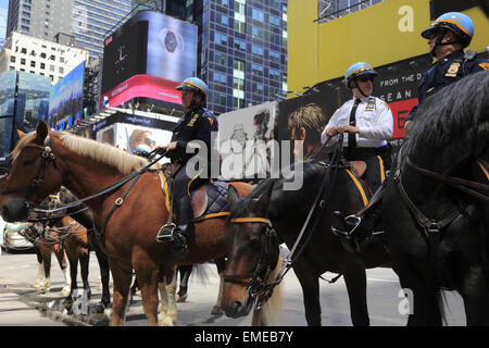 NYPD police officers on horse back in Times Square New York City Stock Photo