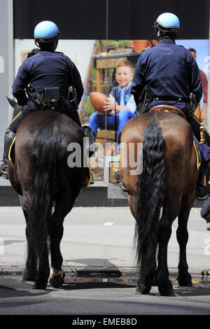 NYPD police officers on horse back in Times Square New York City Stock Photo