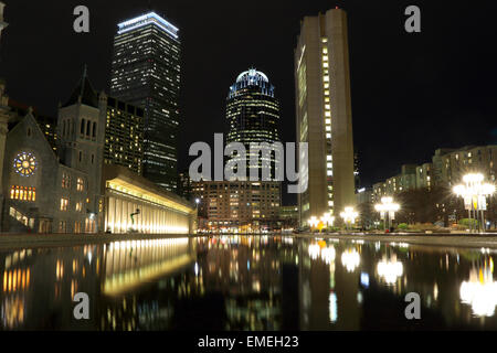 Boston Prudential Tower and 111 Huntington Avenue reflected at night in pool at Christian Science Plaza Back Bay. Boston skyline. Stock Photo