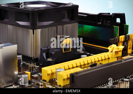 Computer motherboard with CPU cooler, close up Stock Photo