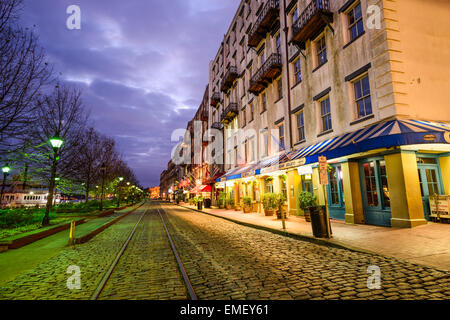 Shops and restaurants line River Street. The historic street is the center of nightlife in the city. Stock Photo