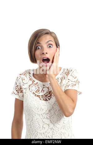 Shocked or surprised woman with a hand on face expressing wow isolated on a white background Stock Photo