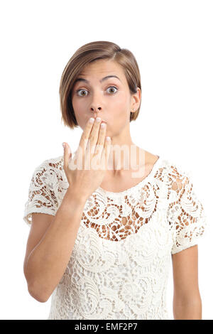 Woman in trouble gesturing oops with a hand on mouth isolated on a white background Stock Photo