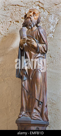 SPISSKY CASTLE, SLOVAKIA - JULY 19, 2014: The gothic carved satue of apostle Matthew from castle chapel. Stock Photo