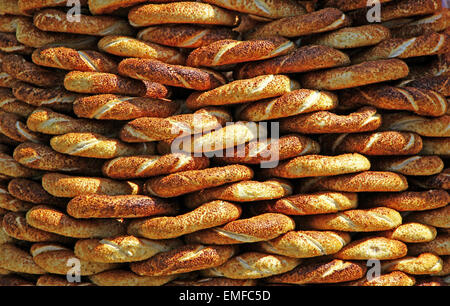 Traditional turkish crispy sesame bagels (simits) seen at a street vendor at Istanbul, Turkey