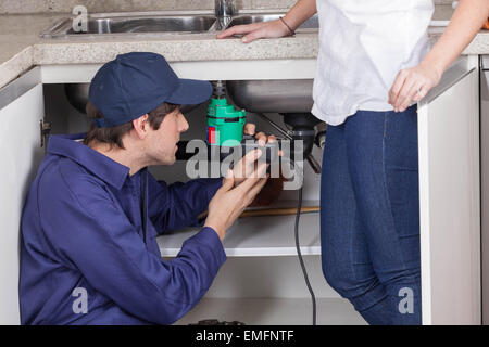 Two plumbers working Stock Photo