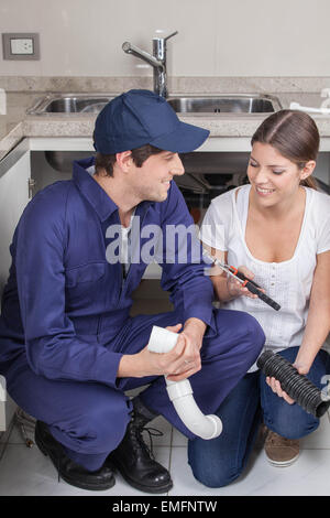 Two plumbers working Stock Photo