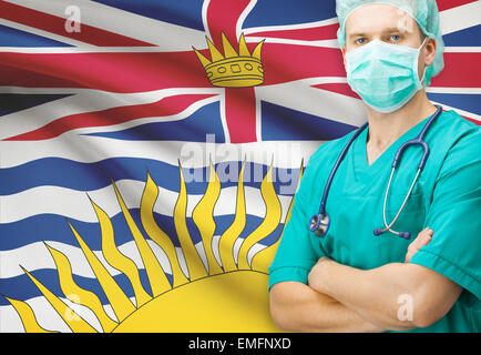 Surgeon with Canadian privinces flag on background - British Columbia Stock Photo