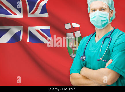 Surgeon with Canadian privinces flag on background - Manitoba Stock Photo