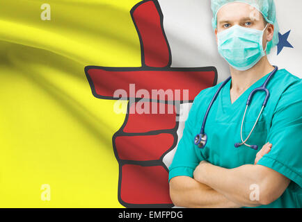 Surgeon with Canadian privinces flag on background - Nunavut Stock Photo