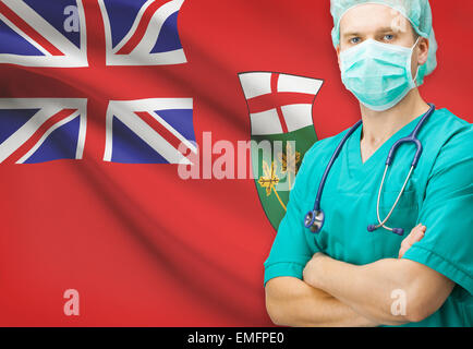 Surgeon with Canadian privinces flag on background - Ontario Stock Photo