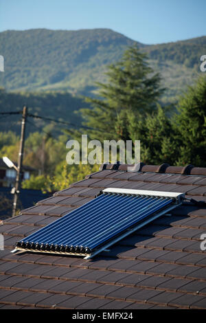 House with solar thermal evacuated vacuum tubes for the hot water ...