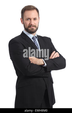 Serious businessman posing with folded arms isolated in a white background Stock Photo