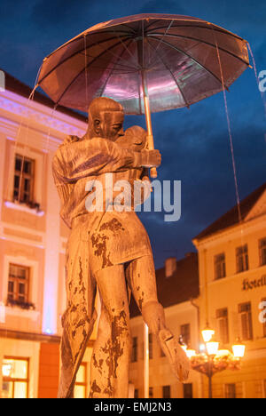 Kissing sculpture on a Raekoja Square in the centre of Tartu city in Estonia,symbolizing romantic and spontaneous students life. Stock Photo