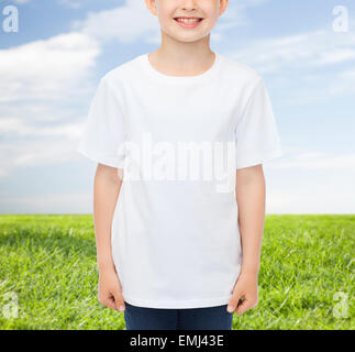 smiling little boy in white blank t-shirt Stock Photo
